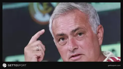 Hakim bayrağı və futbol stadionu yaxınlaşma görüntüsü