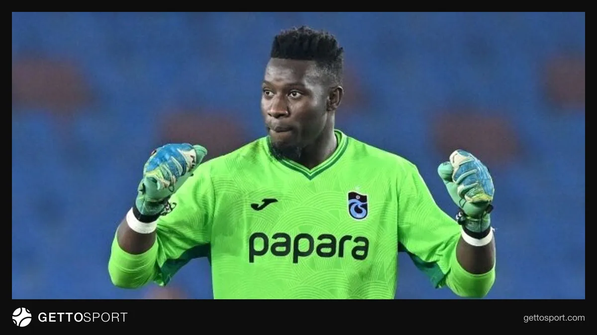 Trabzonspor formasıyla Andre Onana kale önünde topu tutuyor