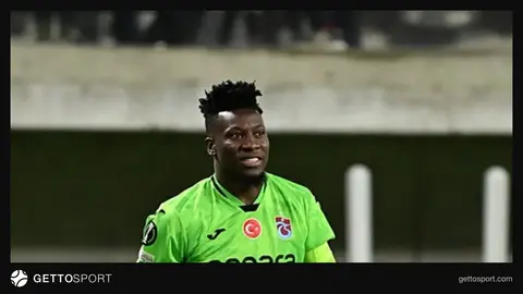 Andre Onana, Trabzonspor kalesinde topa uzanıp kurtarış yaparken