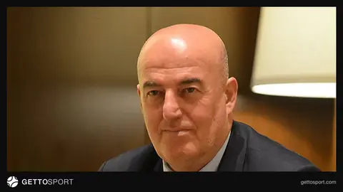 Asim Xudiyev hakim-inspektor kimi, kostyumda portret şəkli