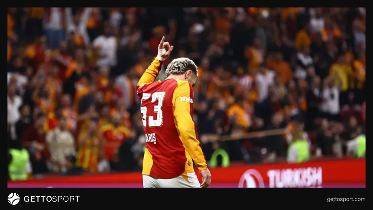 Barış Alper Yılmaz sağ bekte top sürüyor, sarı-kırmızılı forma ile maç anı