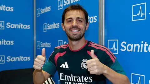 Bernardo Silva ağ forma ilə qolu qeyd edir, Real Madrid loqosu görünür
