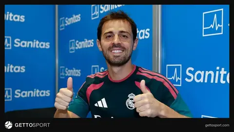 Bernardo Silva ağ forma ilə qolu qeyd edir, Real Madrid loqosu görünür