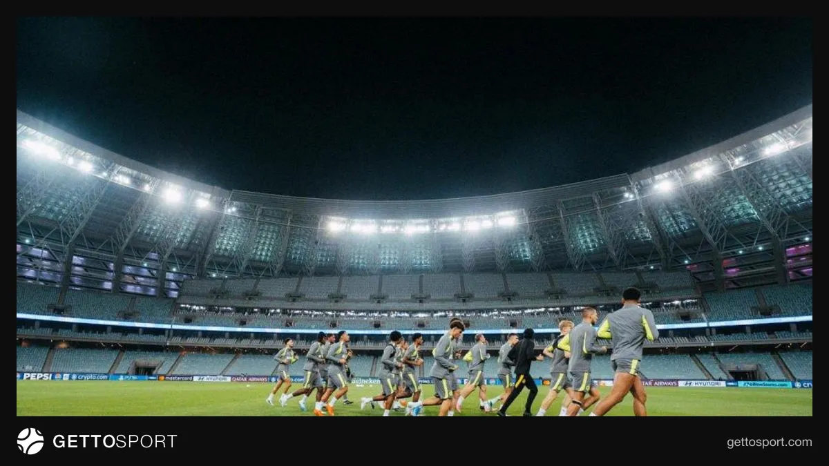 Borussiya futbolçuları və Bakı Olimpiya Stadionunun görüntüsü
