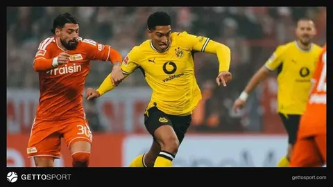 Borussiya Dortmund oyunçuları və Union Berlin qarşılaşması