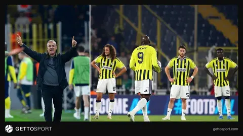 Fenerbahçe teknik direktörü İsmail Kartal sahada düşünceli yürürken