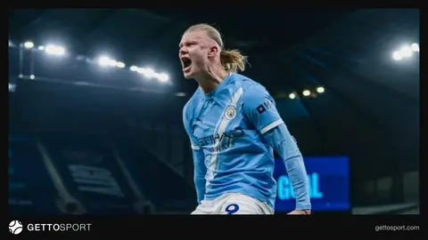 Erlinq Haland qol sevincində, arxa planda Barcelona forması