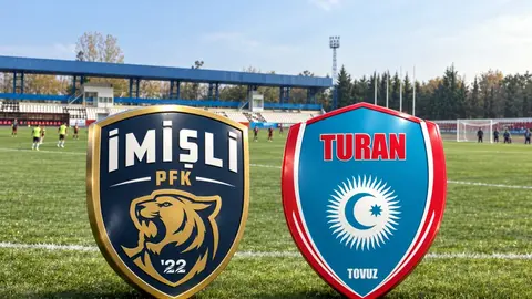 Yevlax şəhər stadionunda matça hazırlaşan İmişli və Turan Tovuz komandaları