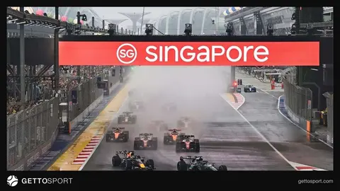 Marina Bay Cadde Pisti'nde yağmur altında sprint başlangıcı ve yarış araçları