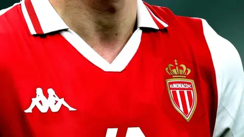 Monako futbol klubunun loqosu və stadion görüntüsü