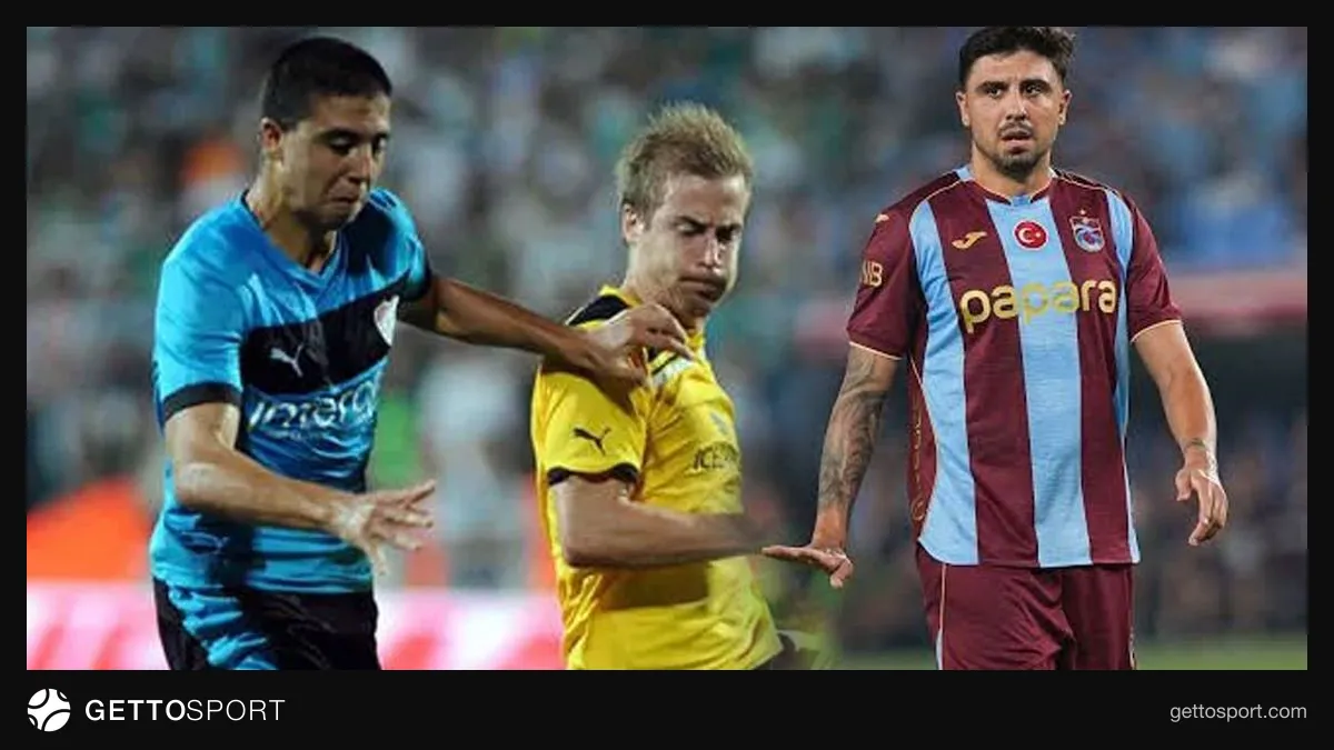 Ozan Tufan maç sırasında takım elbisesi veya formasını giyerken saha kenarında