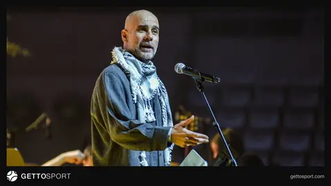 Pep Guardiola bir kamera karşısında konuşurken