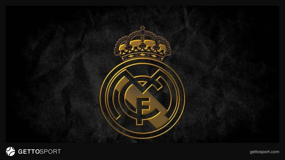 Real Madrid loqosu və Carrell Kuansanın fotosu