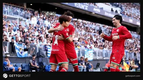 Real Sosyedad oyunçuları La Rosaleda stadionunda qələbəni qeyd edir