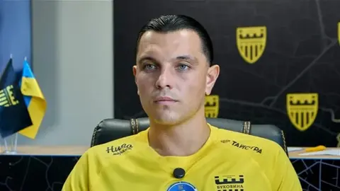 Renat Dadaşov və Bukovina komandası oyun zamanı