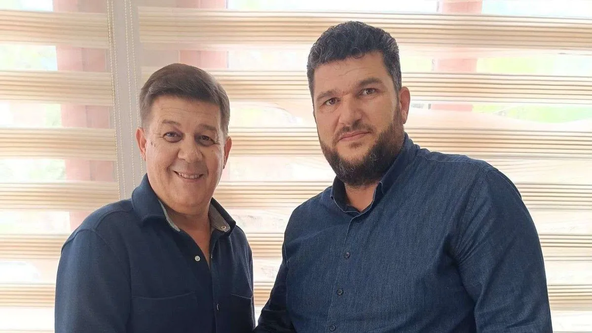 Adanaspor formasıyla Reşat Yılmaz ve kulüp başkanı Osman Yereşen Tesisleri'nde