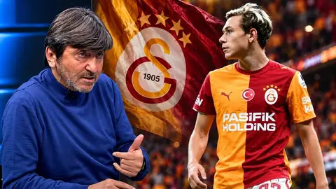 Rıdvan Dilmen stüdyoda yorum yaparken, arka planda Galatasaray-Fenerbahçe derbi görüntüleri