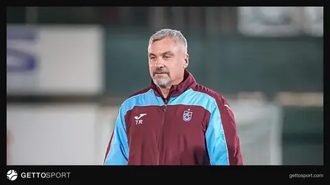 Trabzonspor logosu ve futbolcu silueti