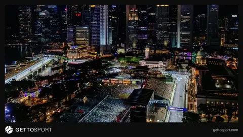 Marina Bay trasında yağış və Formula 1 bolidləri yarış zamanı