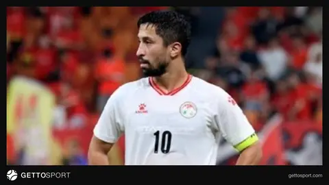 Tacikistan millisinin futbolçuları Çinə qarşı qələbəni qeyd edirlər