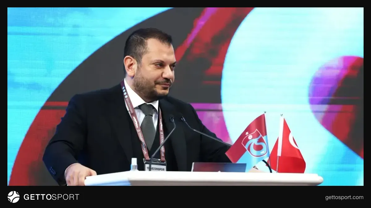 Ertuğrul Doğan yazı yazarken veya Trabzonspor logosu önünde konuşma yaparken