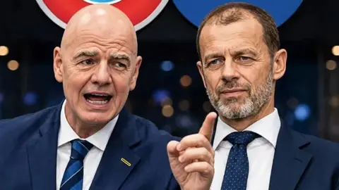 UEFA və FIFA loqoları qarşı-qarşıya, sərgi zalında diskussiya