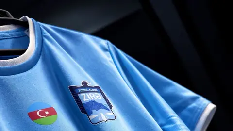 Zirə klubunun rəsmi loqosu və futbol meydançası