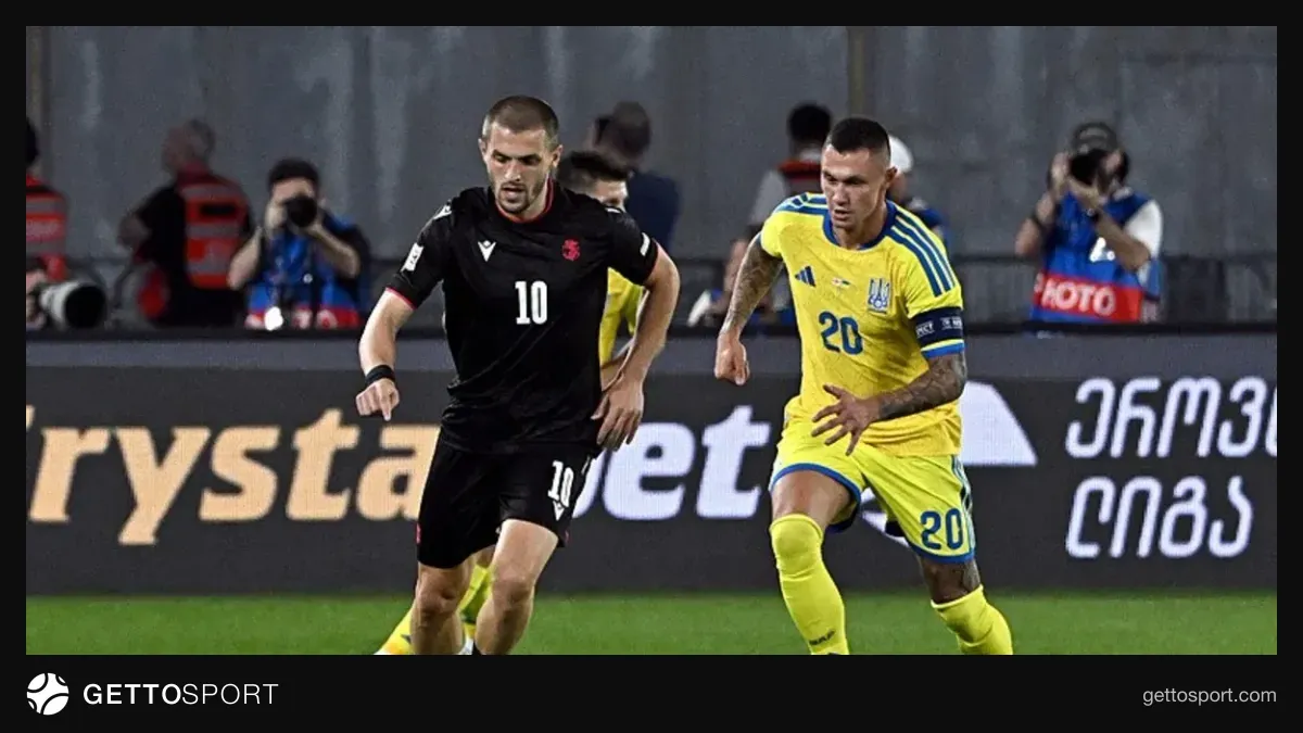 AEK formasıyla Mykola Zubkov kenarda otururken